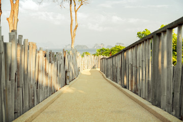 road with fence at seaside