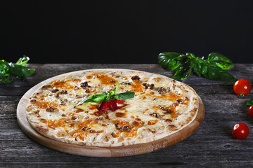 Pizza with walnuts, cheese and tomato paste