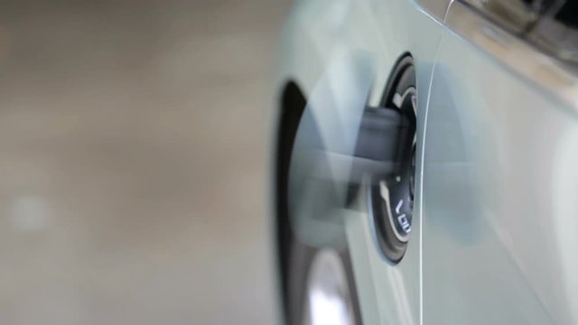 Charging electric car in residential garage