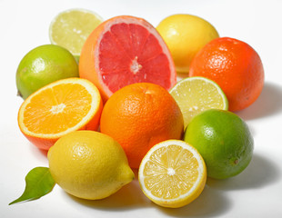 Fototapeta na wymiar Various citrus over white background