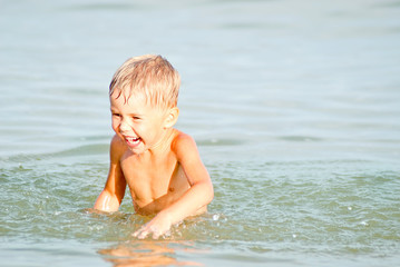happy child on the sea