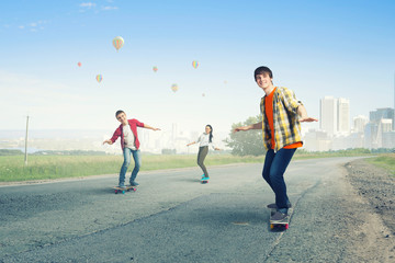 Obraz premium Teenagers ride skateboard . Mixed media