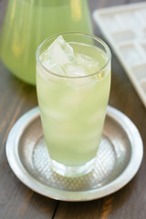 Limeade in a glass with ice cubes