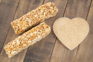 Amaranth bars in the wooden background