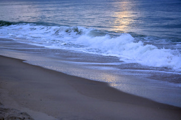 Reflective Blue Seas Beneath Sunrise