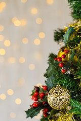 Decorated Christmas tree with bokeh background.