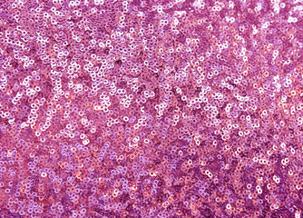 cloth embroidered with pink sequins, background