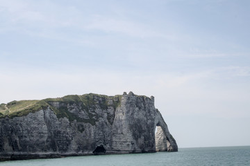 Fototapeta na wymiar Cliff in the sea in Etretat, France