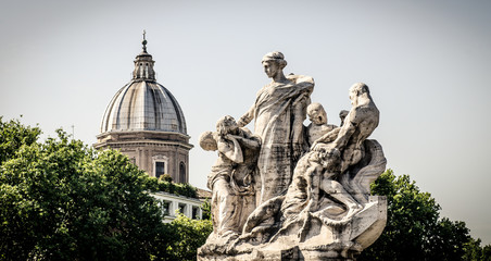 Fototapeta na wymiar Rome, travertine sculptures in Vittorio Emanuele II bridge.