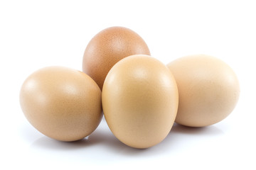 Fresh four eggs isolated on white