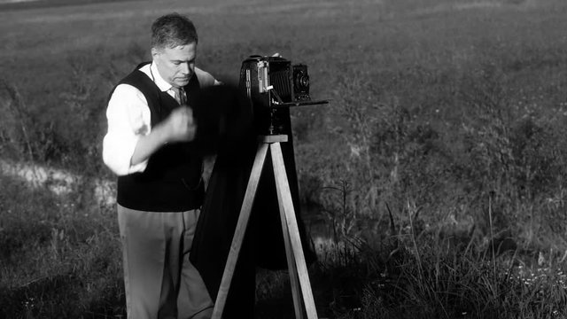 forties era photographer taking nature photos black and white version