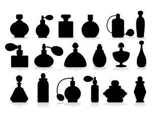silhouette of perfume bottles