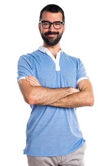 Fototapeta premium Man with blue shirt with his arms crossed
