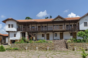 View of inner  part yard with old monastic house in restored Montenegrin or Giginski monastery  St. St. Cosmas and Damian, mountain  Kitka, Breznik, Pernik region, Bulgaria 