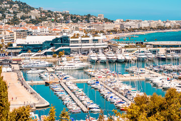 Top cityscape view on french riviera with yachts in Cannes city