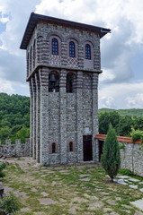 View of inner  part yard with  bell tower in restored Montenegrin or Giginski monastery  St. St. Cosmas and Damian, mountain  Kitka, Breznik, Pernik region, Bulgaria 