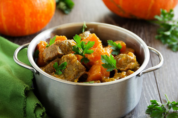 Yellow curry with pumpkin and pork.