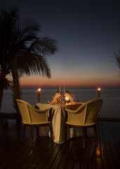 Romantic dinner on a idyllic island facing the Ocean. 
