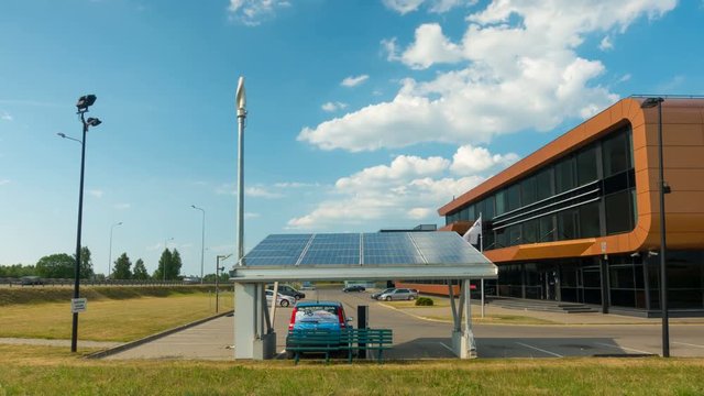 Electric car charging from solar panels, time-lapse