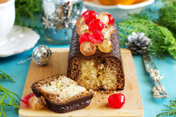 Chocolate cake with candied fruit for Christmas.
