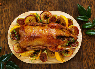 Festive Christmas duck baked with apples and figs.