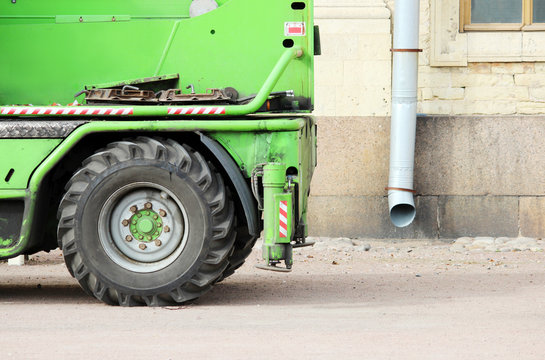 wheel and outriggers heavy equipment machine that works near the palace