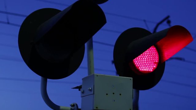 Flashing Lights Warn That A Train Is Approaching
