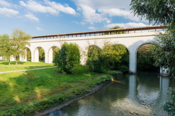 Fototapeta na wymiar Aqueduct bridge across the river
