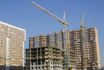 New buildings and construction cranes