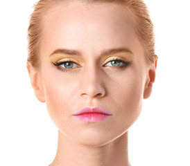 Obraz premium Young woman with beautiful makeup on white background
