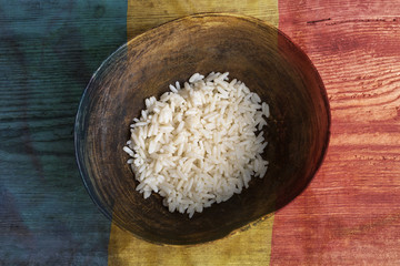 Poverty concept, bowl of rice with Romanian flag