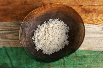 Poverty concept, bowl of rice with Indian flag