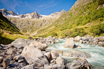 Rapid stream in Swiss Alps, Mountain pass, Sustenpass