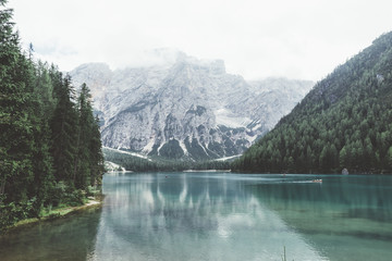 Braies lake with green water and mountains with trees
- 121596948