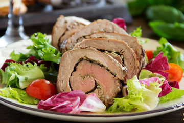 Roast beef with pesto and salad.