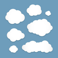 Set of white blank clouds icons for messages or web. Variety shapes, isolated on blue background. Vector illustration, EPS 10.