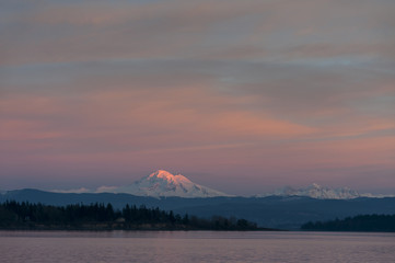 Sunset and Mt. Baker, Washington. A beautiful alpenglow touches Mt. Baker during a glorious winter...