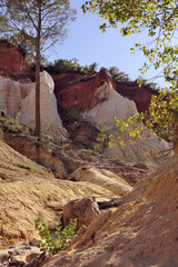Fototapeta na wymiar red landscape dug by six generations of miners ocher Colorado Pr