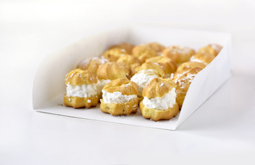 Cream puff cakes with whipped cream