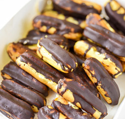 chocolate eclairs on white box