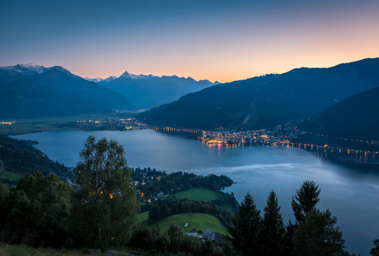 View over Zell am See with lake at night in summer, Salzburg, Austria