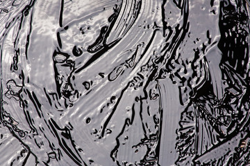 Liquid bitumen surface for backgrounds