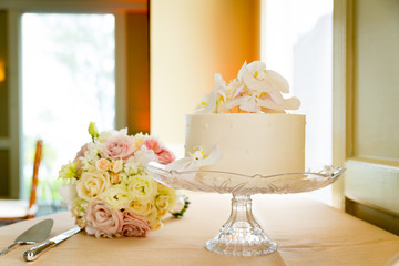 wedding cake and bridal bouquet