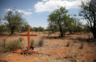 Cross in the Sonoran Desert between the US and Mexico, remembering a migrant who died on the same spot