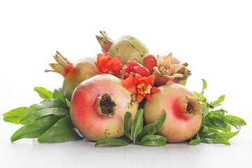 Pomegranates on white background