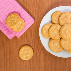 crackers biscuits on wooden background