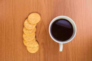 crackers biscuits on wooden background