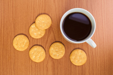 crackers biscuits on wooden background