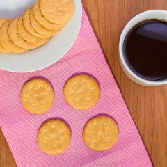 crackers biscuits on wooden background