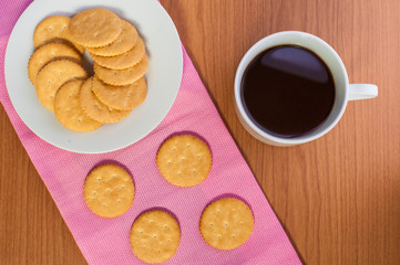 crackers biscuits on wooden background